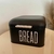 Porta pão Bread em metal preto na internet