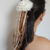 Lacinho de Cabelo com Flor e Fitas Marrom