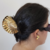 Piranha de Cabelo Dourada - Concha com pérola