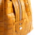 Imagen de CARTERA CAPRI CUERO TRENZADO CURRY