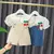 Conjunto Salopete jeans e blusa Menina