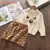 Imagem do Conjunto Blusa e saia de Inverno Menina