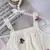 Conjunto top e saia flores Menina - Vem e Vai Infantil