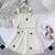 Conjunto top e saia flores Menina - comprar online