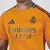 Camisa Real Madrid Away 24/25, camisa torcedor Real Madrid laranja, camisa Adidas Real Madrid Away, camisa masculina Real Madrid 24/25, camisa laranja Real Madrid 2024, camisa Real Madrid Away 2024, camisa Real Madrid laranja 24/25, camisa Adidas Real Mad