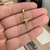PINGENTE CRUZ TRANÇADA PEQUENO (3x2cm) - PRATA BANHADA A OURO 18K