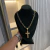 CORRENTE ELO REDONDO FECHO CANHÃO (11MM) - 60 OU 70CM + PINGENTE CRUZ COM CRUZ INTERNA EM BAIXO RELEVO 6CM (6X2,5CM) - PRATA COM OURO 18K - comprar online