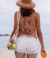 Trajes de baño, blusas y vestidos