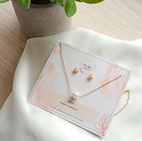 Cadenita En Acero Con Dije En Perla. Más Regalo (topos)