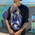 Camiseta Trip Side Oversized Hallow Preta - comprar online