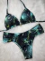 Conjunto top cortininha + calcinha tanga fundo preto com passaros - comprar online