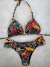Conjunto cortininha + calcinha fio duplo borboleta fundo preto verão 2024/25