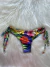 Calcinha biquíni regulável fio duplo estampa tropical ( estampa não uniforme)