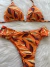 Biquíni com calcinha tanga laranja estampado - comprar online