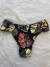 Biquini calcinha tanga fundo preto estampado - buy online