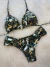 Conjunto top cortininha + calcinha borboleta fio duplo fundo branco com verde militar verão 2026 na internet