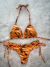 Conjunto top cortininha + calcinha fio duplo regulável laranja estampado na internet