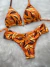 Conjunto top cortininha + calcinha fio duplo borboleta laranja estampado - comprar online