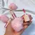 Lip gloss shiny chaveiro com pompom coração - Bobbi Rara na internet