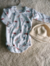 Body mangas largas c/ gorrito polar en internet