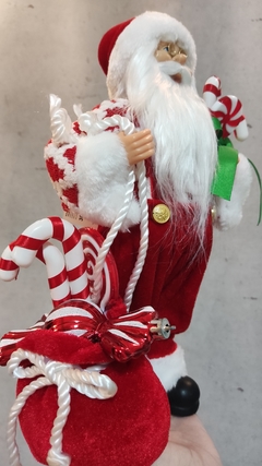 Papai Noel 30cm candy com doces (47705001) na internet