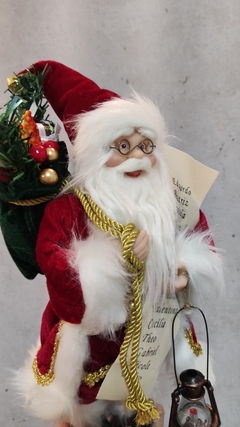 Papai Noel 30cm com lista de nomes e lanterna (50804001) na internet