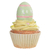 Cupcake decorado com um ovinho de Páscoa em cima, com detalhes em verde e rosa.