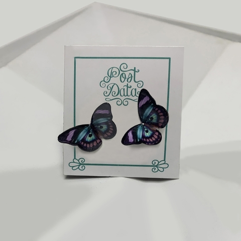 Aretes de mariposa negro con morado (broqueles)