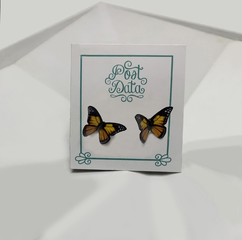 Aretes de mariposa monarca (broqueles)
