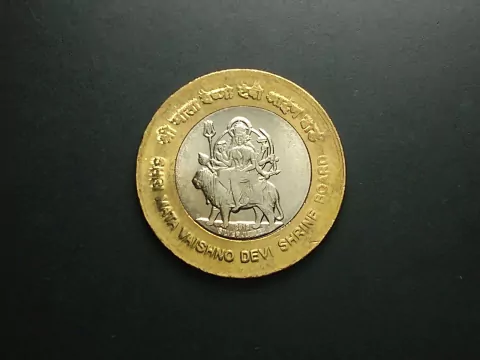 Índia, 10 Rúpias, 2012, Comemorativa 25º aniversário do Santuário de Shri Mata Vaishno Devi Shrine, bimetálica, 27mm