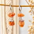 Brinco Aura Calcita Laranja Prata - comprar online