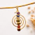 Pingente Chokurei 7 Chakras Dourado na internet