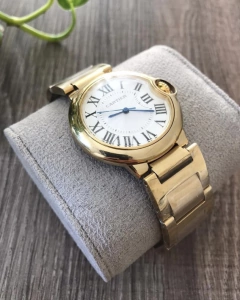 Cartier Ballon Bleu Dourado com Fundo Branco Italiana na internet