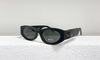 Óculos de Sol Miu Miu Eyewear All Black Italiana