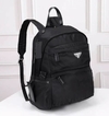 Mochila Prada Média Couro e Re-Nylon Preta Italiana