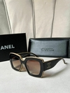 Óculos Chanel Preto e Bege Italiana
