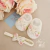 Conjunto Bebê Sapatinho e Faixa Laço Gorgurão Bordado Tali - Off - comprar online