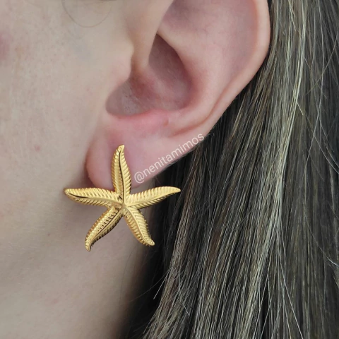 Brinco maxi estrela do mar em aço inoxidável com banho dourado - comprar online