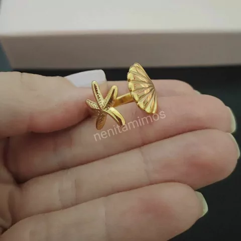 Anel regulável concha e estrela do mar em aço inoxidável com banho dourado