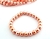 Pulseira Bolinha Pedra Hematita Rose Gold Fio Silicone