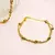 PULSEIRA FIOS DOURADA ZOE - comprar online