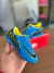 CHUTEIRA SOCIETY MERCURIAL KIDS CELESTE/LIMÃO - loja online