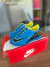 CHUTEIRA SOCIETY MERCURIAL KIDS CELESTE/LIMÃO