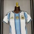 Imagem do Argentina - Casa (COPA DO MUNDO EUA/MÉXICO/CANADÁ 2026) [FEMININA] + PATCH CAMPEÃ COPA 2022
