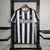 Camisa Castore Newcastle United I 2023/24 - Preto e Branco