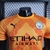 Camisa Puma Versão Jogador Manchester City Goleiro 2022/23 - Laranja - comprar online