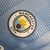 Camisa Puma Versão Jogador Manchester City I 2023/24 - Azul - loja online