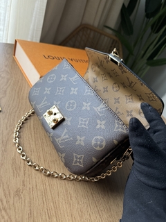 BOLSA POCHETTE MÉTIS EAST WEST na internet