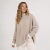 Sweater mujer oversize largo media polera con tajos