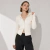 Campera mujer tejida tipo lycra con doble cierre y capucha en internet